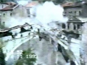 The original bridge collapsing in 1993